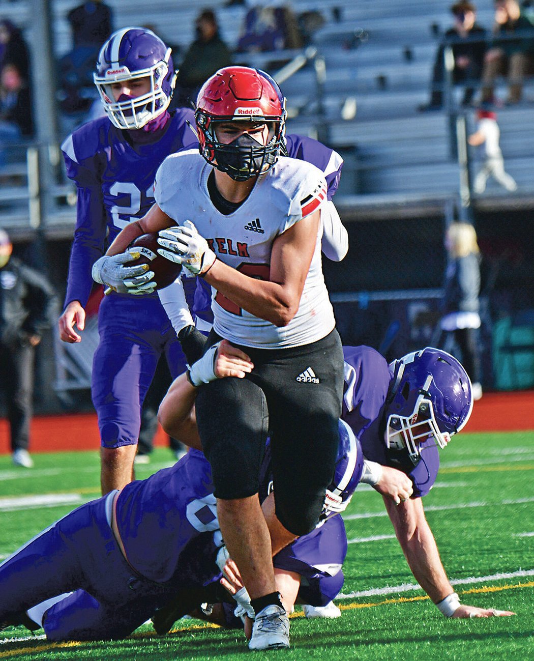 Brayden Platt runs in for a two-point conversion after a touchdown against North Thurston High School in March of 2021 at South Sound Stadium.